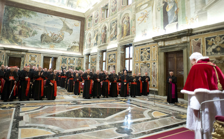 Pope Benedict XVI addresses the College of Cardinals on Thursday at the Vatican. (CNS/Reuters/L'Osservatore Romano)