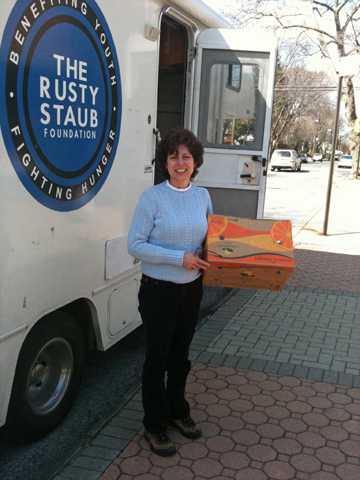 Linda Livornese Wilkie, 63, poses with the Rusty Staub Foundation's mobile food pantry.