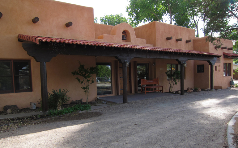 Visitors to the Center for Action and Contemplation are welcomed by the warm adobe buildings that date back more than a century. (David S McKee)