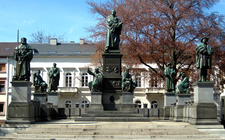 Martin Luther stands at the center of the Reformation Monument in Worms, Germany. (Wikimedia Commons/JD)