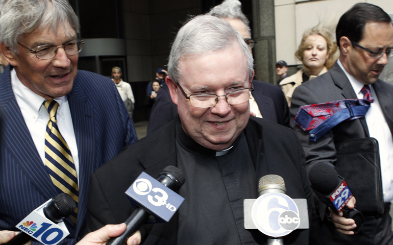 Msgr. William Lynn exits the courthouse for lunch on the opening day of his child sex abuse trial in late March 2012 in Philadelphia. (CNS/Reuters/Tim Shaffer)
