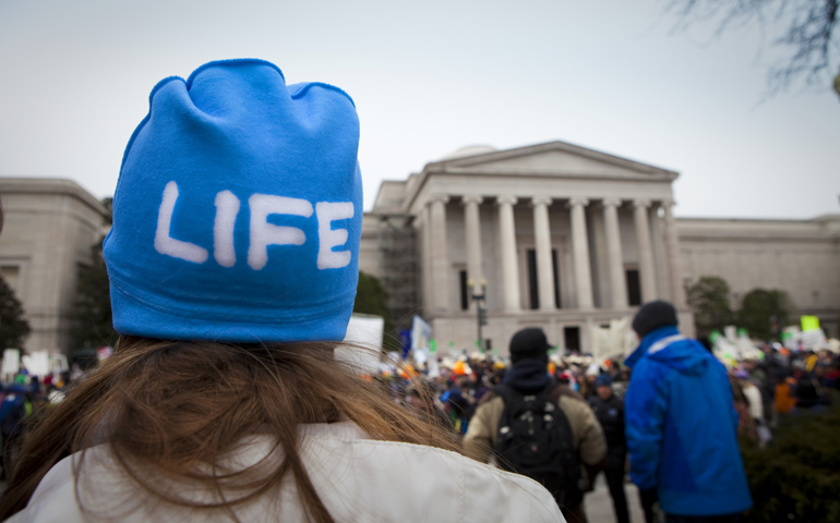 Madeline Bauer of St. Paul, Minn., stands in front of the U.S. Supreme Court building during the 2013 March for Life in Washington. (CNS/St. Louis Review/Lisa Johnston)