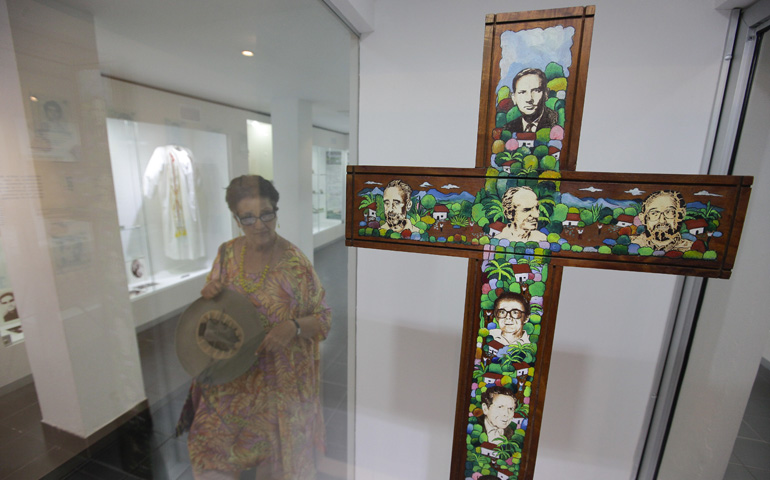 A tourist visits in 2012 a museum at the University of Central America with the personal effects of the six Jesuit priests killed by the army in 1989 in San Salvador, El Salvador. (Newscom/EFE/Roberto Escobar)
