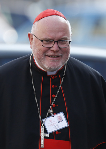Cardinal Reinhard Marx of Munich and Freising, Germany, arrives for the Oct. 7 morning session of the extraordinary Synod of Bishops on the family at the Vatican. (CNS/Paul Haring)