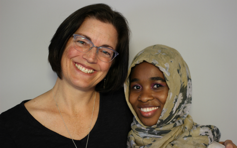 The author Marybeth Christie Redmond, left, and Madina Dhahir Haji