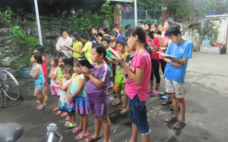 Sr. Mary Lan prays with street children each evening. (Provided photo)