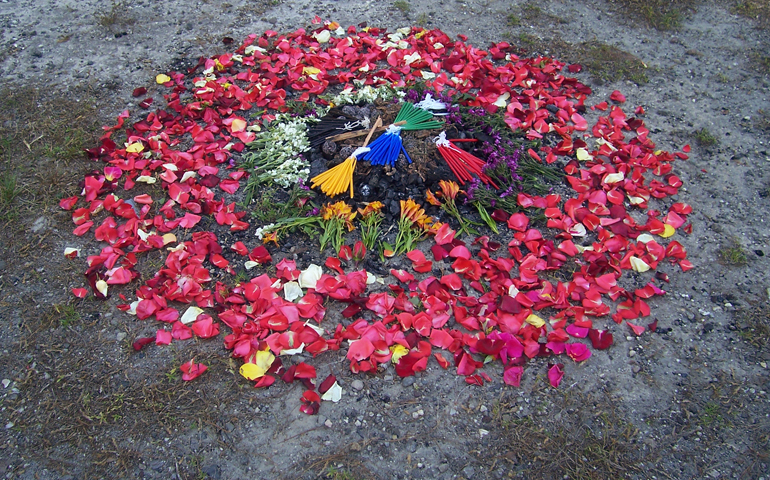 The fire pit set for a Mayan prayer service