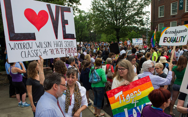 About 1,000 students and other community members rally in support of Principal Pete Cahall June 9 at Woodrow Wilson High School in Washington, D.C. (AFP Photo/Getty Images/Paul J. Richards)