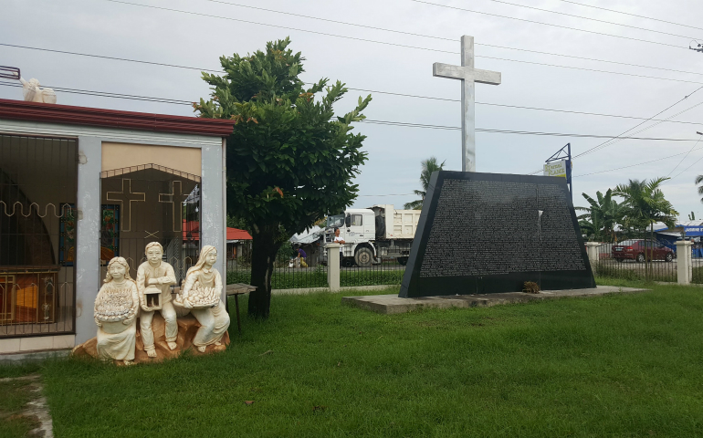 one of several memorials in Tacloban and throughout the island of Leyte marking the mass graves that were needed after Typhoon Haiyan,  locally known as Yolanda, swept through the central Philippines on Nov. 8, 2013. (GSR photo/Gail DeGeorge)