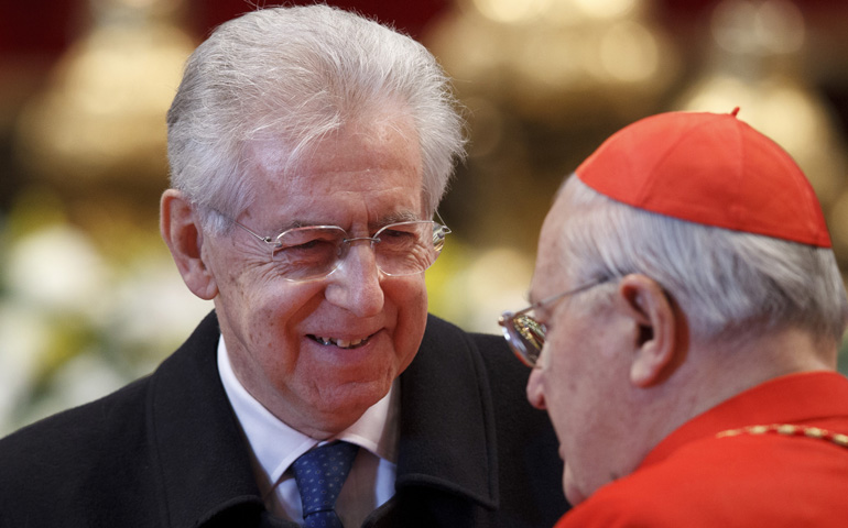 Italy's Prime Minister Mario Monti talks with Cardinal Angelo Sodano, dean of the College of Cardinals, Jan. 6. (CNS/Paul Haring)