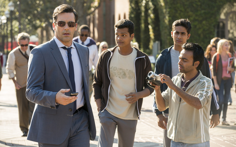 Jon Hamm, Madhur Mittal, Suraj Sharma and Pitobash in a scene from the movie "Million Dollar Arm" (CNS/Disney)