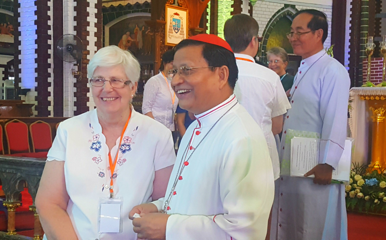 Sr. Patricia Murray, executive secretary of International Union of Superior Generals, left, who was in Yangon for the AMOR XVII meeting, poses with Cardinal Charles Bo. (NCR photo/Gail DeGeorge)