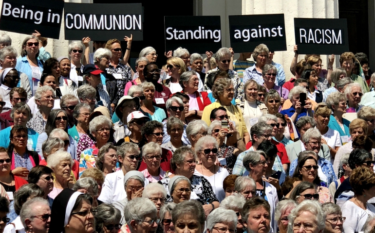 Marching to the Old Courthouse in downtown St. Louis Aug. 10, sisters with the Leadership Conference of Women Religious stand against systemic racism and their historic complicity. (GSR photo / Soli Salgado)