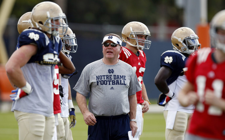 University of Notre Dame head coach Brian Kelly watches his team during practice Thursday for the NCAA college football 2013 Discover BCS National Championship game Monday against the University of Alabama in Davie, Fla. (CNS/Reuters/Jeff Haynes)