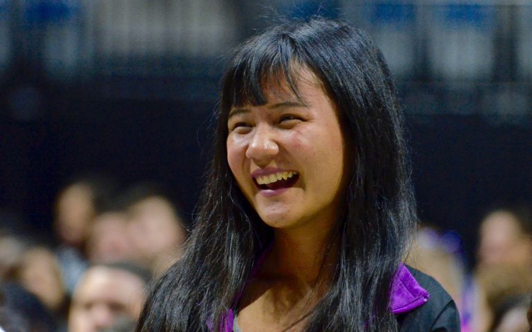 Niang En Chin laughs during graduation practice June 8. Her family came to the United States as refugees from Burma, now known as Myanmar, and she graduated in the Top Ten in her class at North Side High School in Fort Wayne, Indiana. (GSR photo/Dan Stockman)