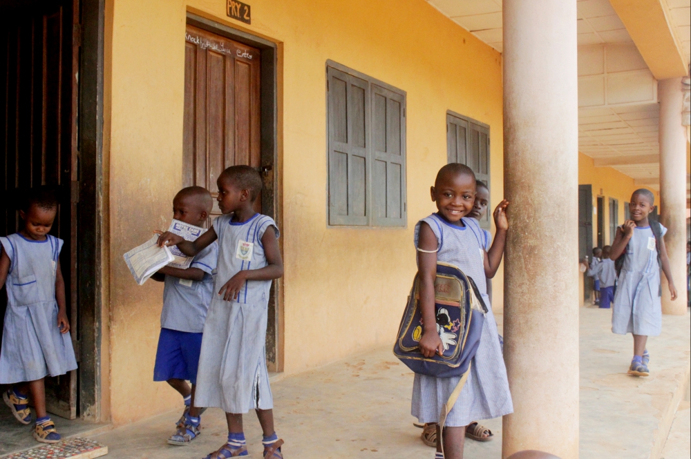 Children are seen after the bell rings for dismissal at the Notre Dame Nursery and Primary School, run by the Sisters of Notre Dame de Namur in Ugwuomu Nike, an isolated community in Nigeria's Enugu state. (Patrick Egwu)