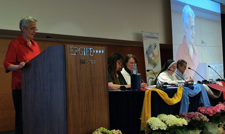 Congregation of Jesus Sr. Martha Zechmeister, at left, speaks at the UISG assembly in Rome May 7. (NCR photo/Robyn J. Haas)