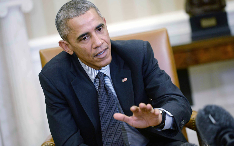 President Barack Obama speaks to reporters Feb. 4 (CNS/EPA/Olivier Duliery)