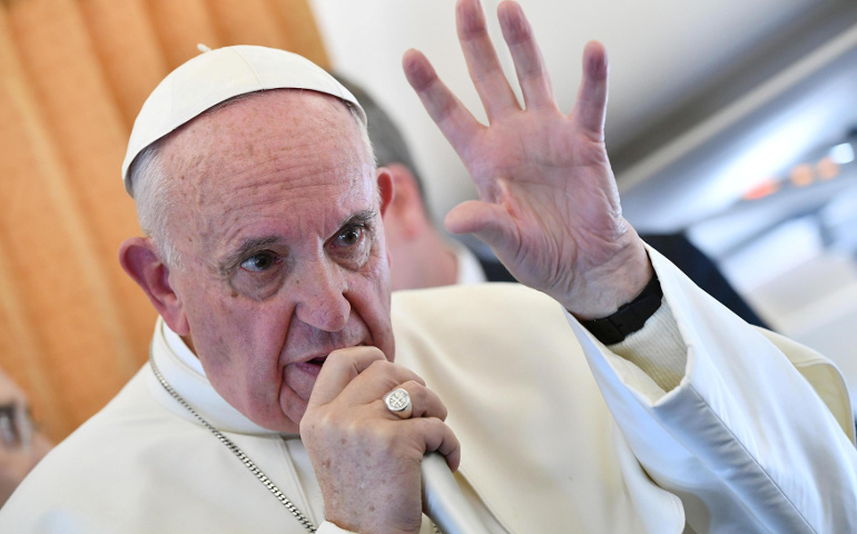 Pope Francis speaks to journalists on his flight back to Rome from Sweden on Nov. 1, 2016. (Photo courtesy REUTERS/Ettore Ferrari/Pool)