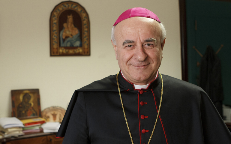 Archbishop Vincenzo Paglia, president of the Pontifical Council for the Family, is pictured in his office in December at the Vatican. (CNS/Paul Haring) 