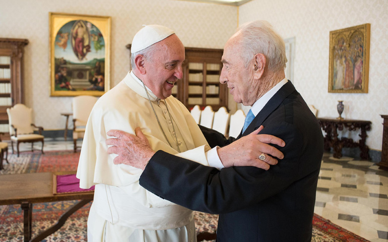 Pope Francis welcomes former Israeli President Shimon Peres during their meeting Thursday at the Vatican. (CNS/EPA/L'Osservatore Romano)