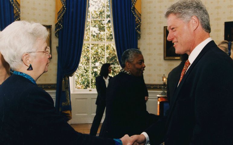 Sr. Catherine Pinkerton, left, greets President Bill Clinton, Jan. 6, 1997. (White House photo)