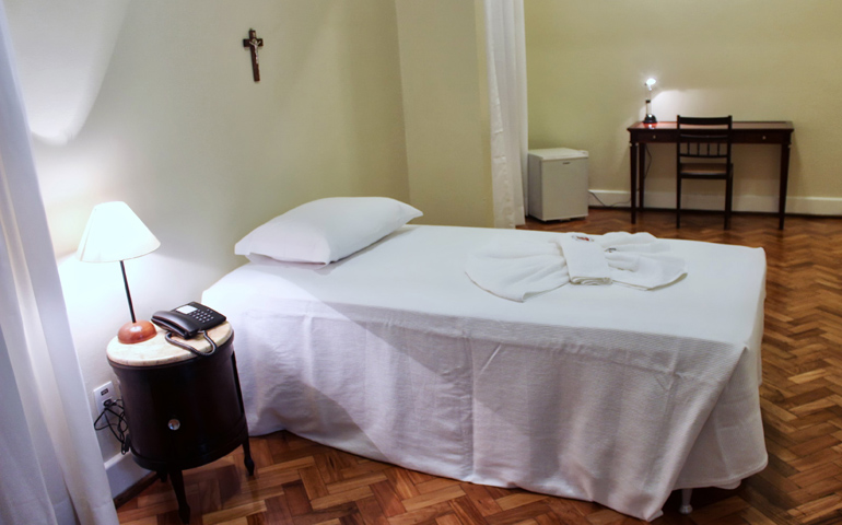 The bedroom Pope Francis will be staying in when he visits Brazil is a sparsely furnished one at the church-run Sumare Residence. The room is pictured in a handout photo from the Pontifical Council for Social Communications. (CNS) 