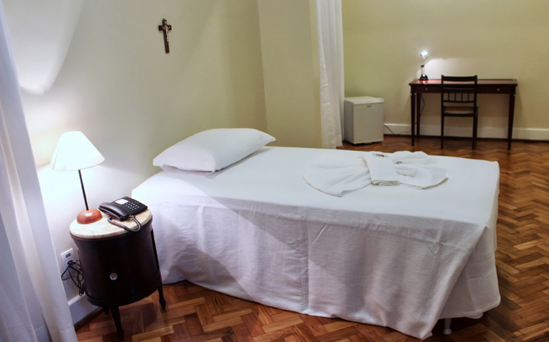 The bedroom Pope Francis will be staying in when he visits Brazil is a sparsely furnished one at the church-run Sumare Residence. The room is pictured in a handout photo from the Pontifical Council for Social Communications. (CNS)