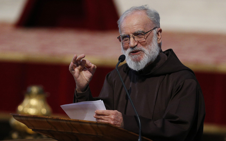 Capuchin Fr. Raniero Cantalamessa preaches during the 2014 Good Friday liturgy led by Pope Francis in St. Peter's Basilica at the Vatican. (CNS/Paul Haring)