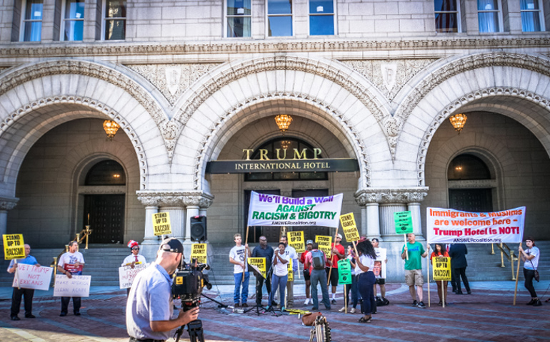 Protesters denounce Donald Trump outside the the Trump International Hotel in Washington, D.C., in September 2016 (Wikimedia Commons/Ted Eytan)