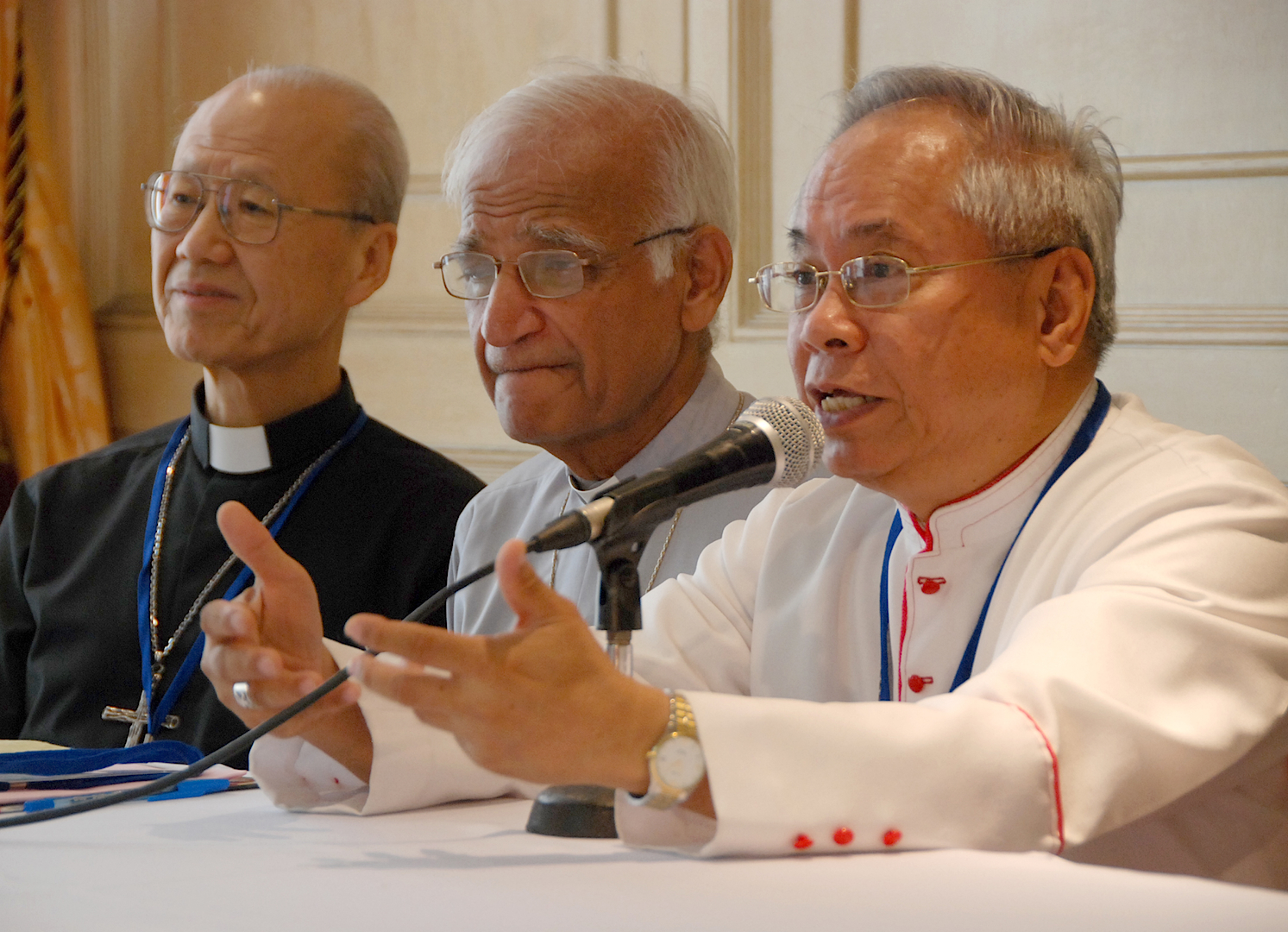 Cardinal-designate Orlando Quevedo addresses a press conference for the 9th Federation of Asian Bishops' Conferences plenary assembly in 2009 in Manila. Pakistan Archbishop Lawrence John Saldanha of Lahore and now-Cardinal John Tong Hon of Hong Kong look on. (Roy Lagarde)