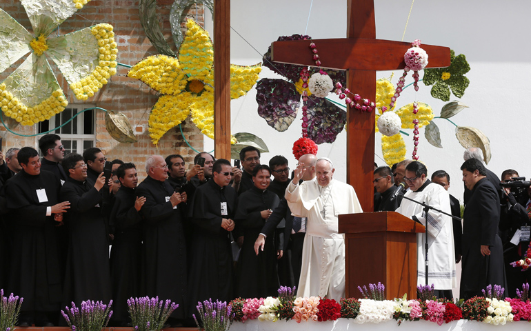 Pope Francis waves during a meeting with clergy, religious men and women, and seminarians Wednesday at the El Quinche National Marian Shrine in Quito, Ecuador. (CNS/Paul Haring)