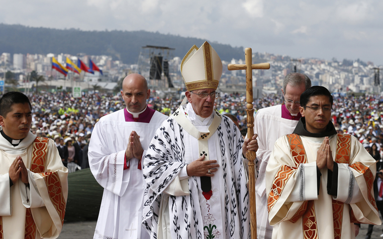 Pope Francis arrives to celebrate Mass on Tuesday in Bicentennial Park in Quito, Ecuador. (CNS/Paul Haring)