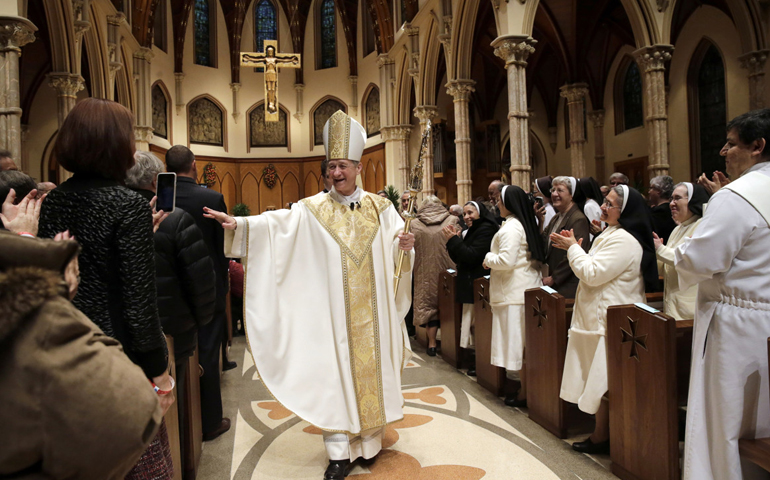 Archbishop Blase Cupich walks down the aisle after his Installation Mass at Holy Name Cathedral in Chicago on Nov. 18, 2014. (Reuters/Charles Rex Arbogast/Pool)