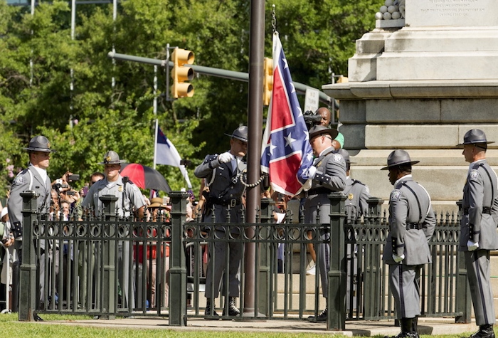 The Confederate battle flag is permanently removed from the South Carolina statehouse grounds during a ceremony in Columbia, South Carolina, July, 10, 2015. (Religion News Service, courtesy of REUTERS/Jason Miczek)