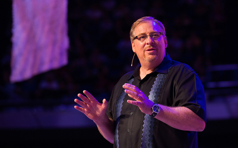 The Rev. Rick Warren, evangelical leader at Saddle Back Church in Lake Forest, Calif., gives a keynote address March 13 at the Los Angeles Religious Education Congress. (CNS/Vida Nueva/Victor Aleman)