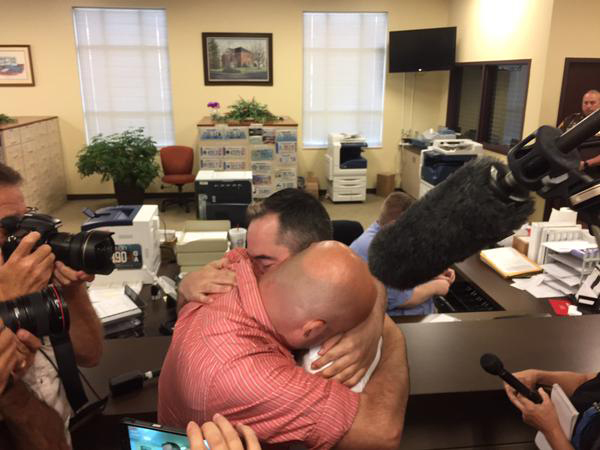 William Smith and James Yates received a marriage license Friday, Sept. 4, 2015, from Rowan County (Ky.) Deputy Clerk Brian Mason. Photo: Mike Wynn, The (Louisville, Ky.) Courier-Journal