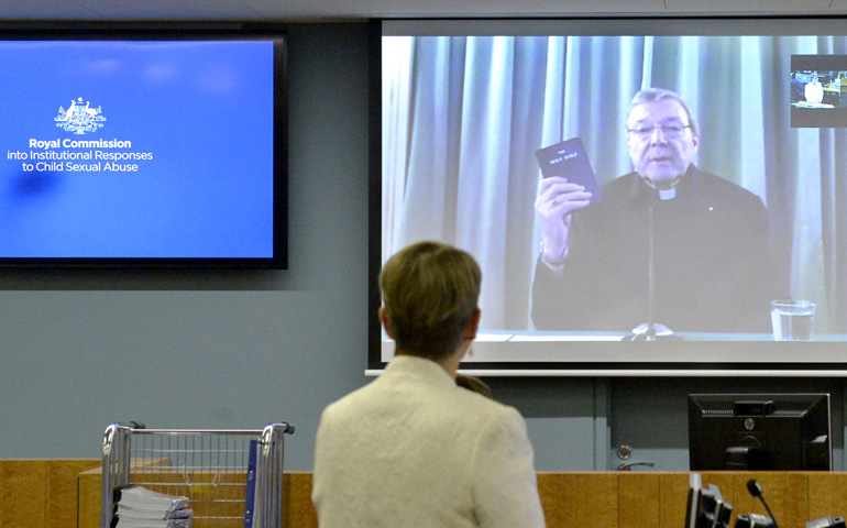 Cardinal George Pell is seen being sworn in for the hearing, from the Commission hearing room in Sydney. (Courtesy Royal Commission into Institutional Responses to Child Sexual Abuse)