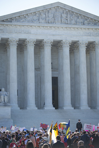 Supporters of traditional marriage and same-sex marriage gather in front of the U.S. Supreme Court building Tuesday in Washington. (CNS/Tyler Orsburn)