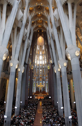 People attend a "Courtyard of the Gentiles" dialogue in May 2012 inside the Basilica of the Sagrada Familia in Barcelona, Spain. (CNS/Reuters/Albert Gea)