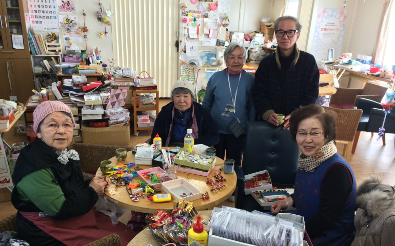 Community at the Magokoro Salon in Minamisoma: standing, Caritas Minamisoma staff members Sr. Masako Egawa, and Masayuki Yamada; seated, from left, Sumii Sato, Kori Mine and Nagomi Matsuura. (David DeCosse)