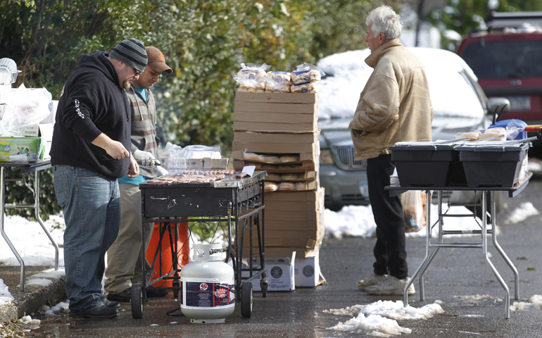 Volunteers grill food Nov. 8 for people affected by Hurricane Sandy in Staten Island, N.Y. (CNS/Bob Roller)