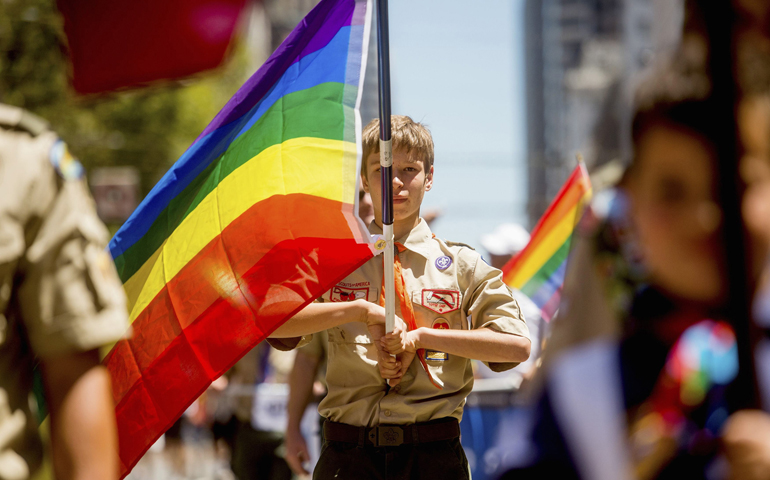 A Boy Scout carries a rainbow flag during the San Francisco Gay Pride Festival in California on June 29, 2014. (CNS/Reuters/Noah Berger)