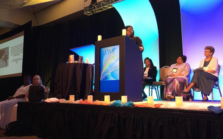 Shannen Dee Williams, at podium, addressed the LCWR membership August 12 about racism in U.S. religious life. (GSR/Dawn Araujo-Hawkins)