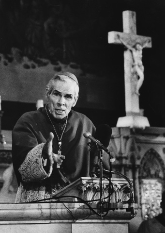 Archbishop Fulton Sheen is pictured at a pulpit in an undated file photo. (CNS file photo)