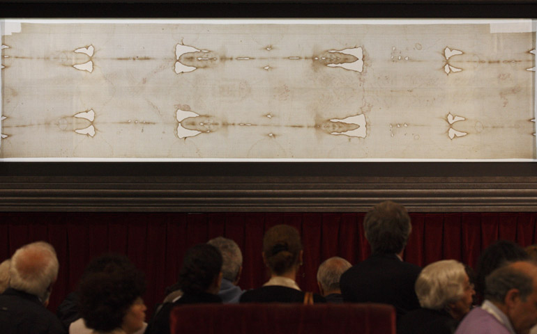 People view the Shroud of Turin at the Cathedral of St. John the Baptist in Turin, Italy, in 2010. (CNS/Paul Haring) 