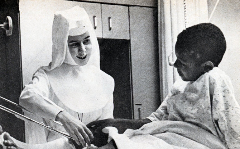 Sr. Barbara Lum at work in the pediatric ward at Good Samaritan Hospital in Selma, Ala. (Archives of the Sisters of St. Joseph of Rochester)