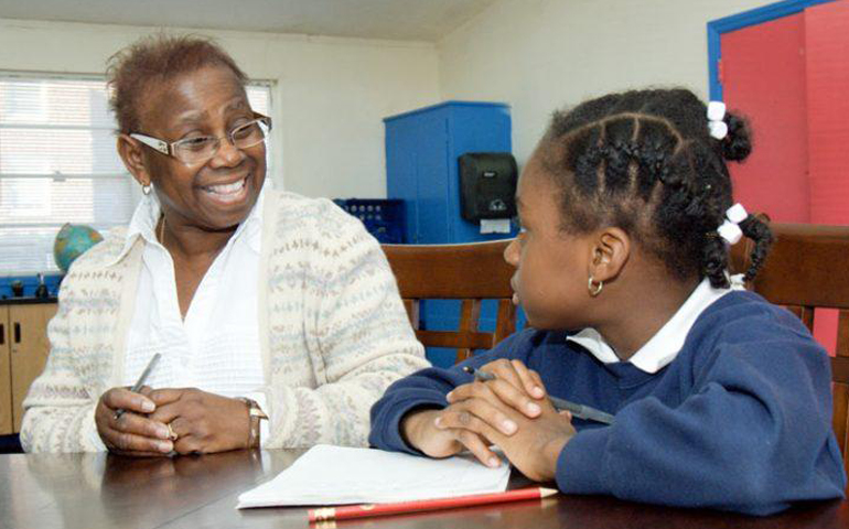 Sister of St. Mary of Namur Roberta Fulton, left, with a student of St. Martin de Porres Catholic School in Columbia, S.C. (Provided photo)