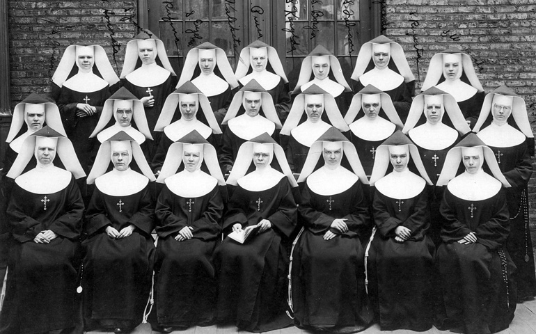 Nuns pose outside St. Mary of Perpetual Help School in Chicago in 1922. The image appears in a documentary titled "Women & Spirit: Catholic Sisters in America," airing on NBC as part of its "Horizons of the Spirit" series. (CNS/Courtesy Leadership Conference of Women Religious)