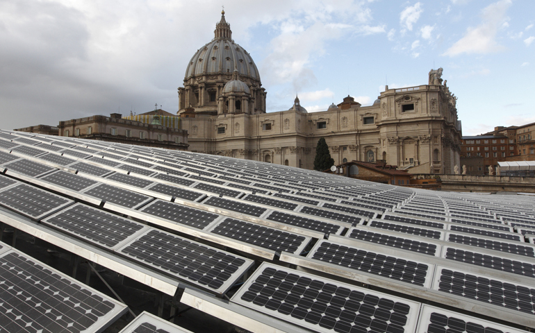 Solar panels are seen on the roof of the Paul VI audience hall at the Vatican. Installed in 2010, the 2,400 panels were one of the eco-initiatives undertaken during Pope Benedict XVI's tenure. (CNS photo/Paul Haring)